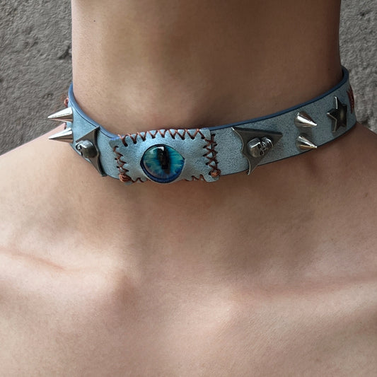 Mystic Denim Eye Choker - Edgy Spiked Choker with Blue Cat Eye and Skull Charms